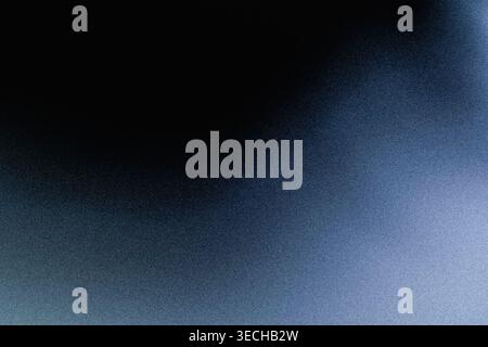 Dark blue grainy abstract background with soft gradient overlay Stock Photo