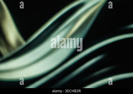 Sharp teal and green grainy light rays on dark background Stock Photo
