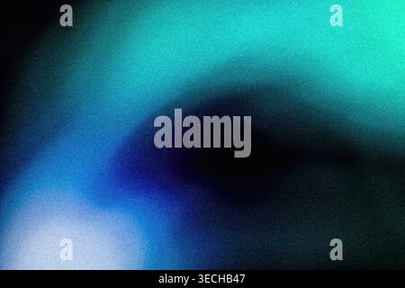 Soft blue and teal grainy circular glow on a dark abstract background Stock Photo