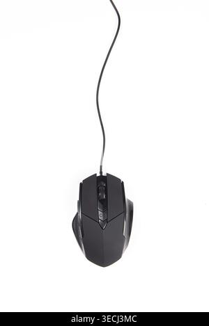 Black wired computer mouse on a clean white background, creating a minimalist high-tech theme Stock Photo