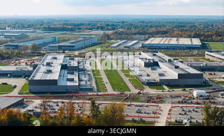 Large data center campus sprawling with multiple buildings and green spaces Stock Photo