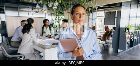 Supervising collaborative design critique session leader Stock Photo