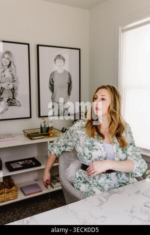 Woman working in stylish home office Stock Photo
