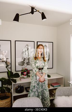 Stylish woman in modern home office interior Stock Photo