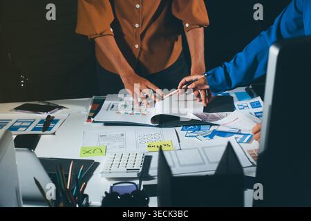 UXUI design brainstorming session with sketches and digital tools Stock Photo