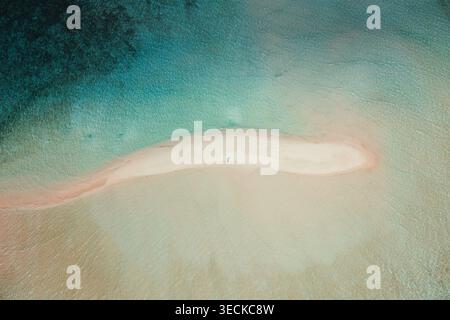 Aerial view of the white sandbar surrounded by turquoise water with ...