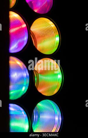 A beautiful close up of colorful LED lights in empty tin cans. An art installation outdoors in Geiranger during Light Art Festival in winter, UNESCO W Stock Photo