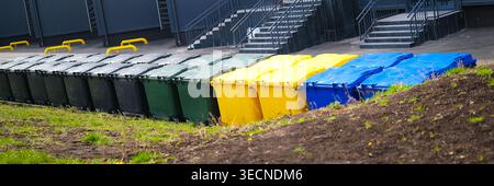Lots of colorful plastic garbage containers Stock Photo