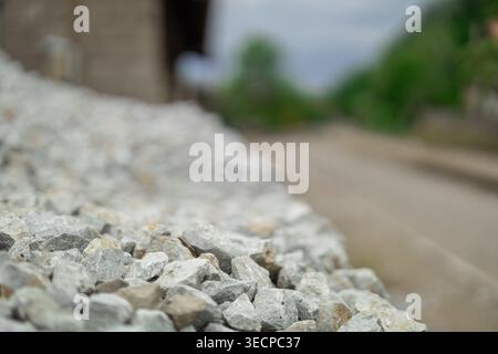 Crushed Stone Aggregate Piled in Warm Golden Sunlight with Rough ...