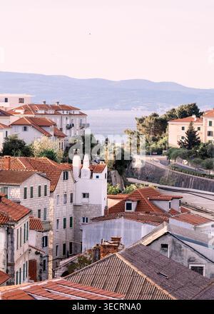 View across the rooftops in Split in Croatia to the Adeatic sea. Stock Photo