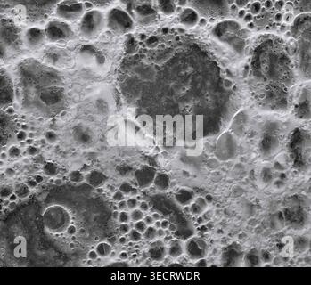 Macro photograph capturing the intricate patterns and texture of bubbles on the surface of a milk-containing drink. The closeup highlights the unique Stock Photo