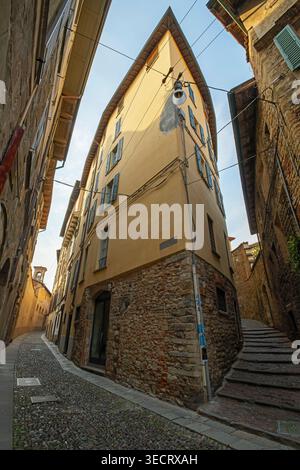 Medieval Via Arena is narrow street in Upper Town (Citta Alta) of Bergamo city, Lombardy, Italy. Stock Photo