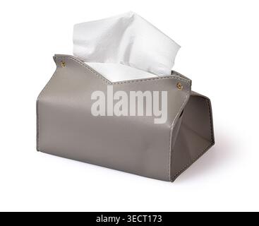 Grey faux leather tissue holder containing white facial paper on a white background Stock Photo
