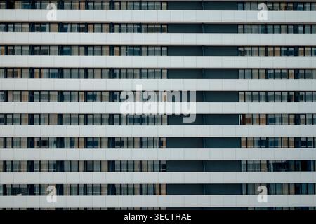 Abstract architectural shot of a modern building featuring repeating horizontal lines and glass Stock Photo