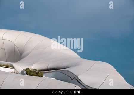 Modern curved architecture at Saadiyat Island Abu Dhabi with abstract white facade design Stock Photo