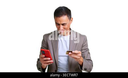 Man making online payment using smartphone and credit card Stock Photo