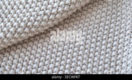 Beige Knitted Fabric Texture with Soft Cozy Pattern Stock Photo