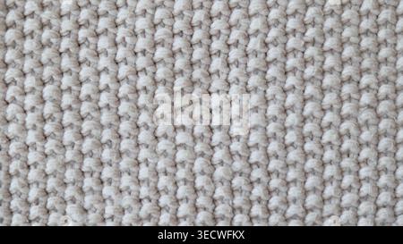 Beige Knitted Fabric Texture with Soft Cozy Pattern Stock Photo