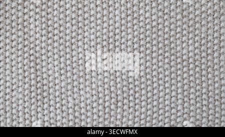 Beige Knitted Fabric Texture with Soft Cozy Pattern Stock Photo