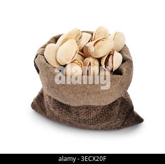 Pistachio nuts in sack isolated on white Stock Photo