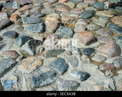 A fragment of an old cobblestone street Stock Photo