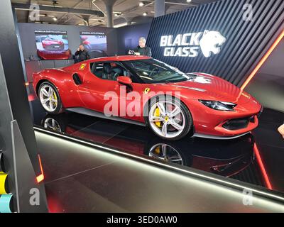 Black Glass Red Sports Car Exhibition Display Stock Photo