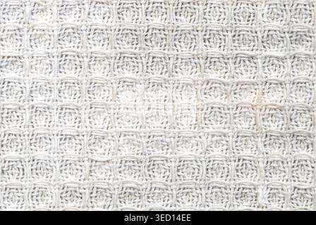 Crochet knitted square pattern white colour macro Stock Photo