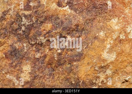 Brown golden stone rough texture Stock Photo