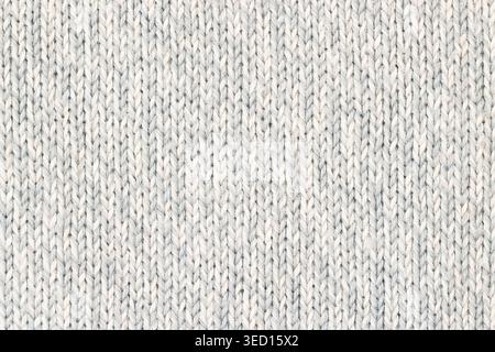 Knitted melange white and blue pattern cotton woolen background macro Stock Photo