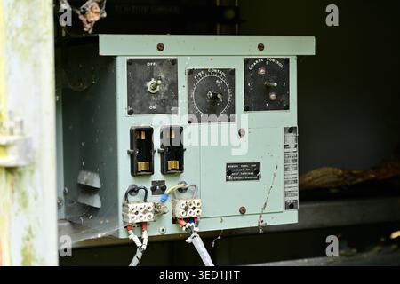 Old electrical control unit in rusty outdoor enclosure, UK Stock Photo