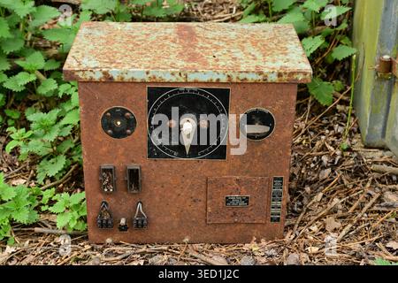Old electrical control unit in rusty outdoor enclosure, UK Stock Photo