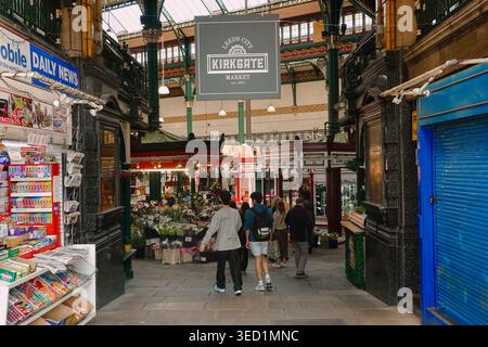 Ornate Victorian interior of Leeds Kirkgate Market featuring a historic market stalls, Leeds, West Yorkshire, England, UK Stock Photo