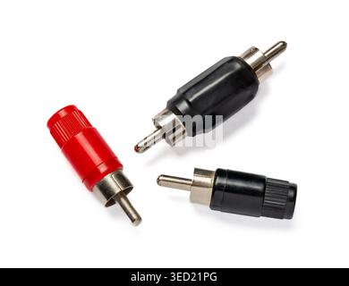 Closeup of three RCA male connectors used for audio and video signal transmission showing red and black plugs with metal pins and plastic housings iso Stock Photo