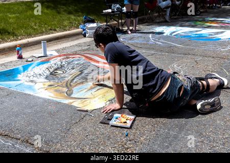 Mount Vernon, Iowa, USA - May 2, 2026: Chalk the Walk Artist Working on American Bald Eagle Art Stock Photo