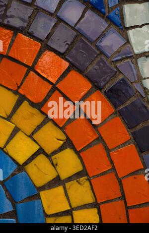 Vibrant multi colored ceramic mosaic tiles in a decorative pattern Stock Photo