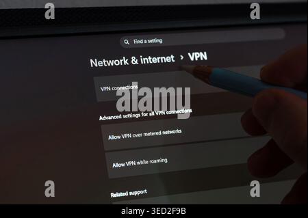 New York, USA - April 29, 2026: Change vpn settings in windows browser on computer screen close up view Stock Photo