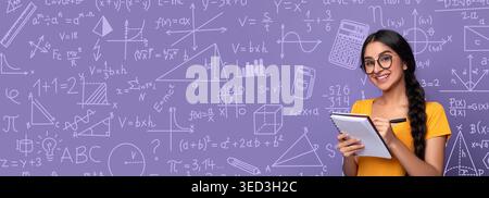 Student Makes Notes in a Classroom Set Against a Purple Math and Science Collage Background Stock Photo