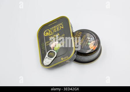 Kyiv, Ukraine - October 5, 2023: Two premium canned seafood products from the Adriatic Queen brand closeup on white. Tuna fillets in olive oil and sea Stock Photo