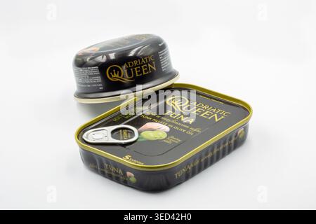 Kyiv, Ukraine - October 5, 2023: Two premium canned seafood products from the Adriatic Queen brand closeup on white. Tuna fillets in olive oil and sea Stock Photo