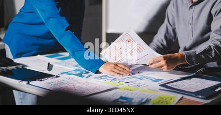 Team of Program Developer Collaborating on UXUI Design Planning in a Modern Office Environment Stock Photo
