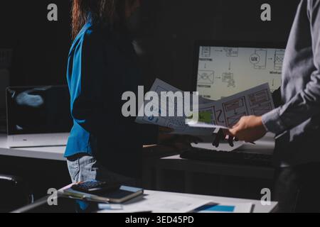 Team of Program Developer Collaborating on UXUI Design Planning in a Modern Office Environment Stock Photo