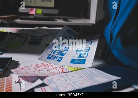 Team of Program Developer Collaborating on UXUI Design Planning in a Modern Office Environment Stock Photo