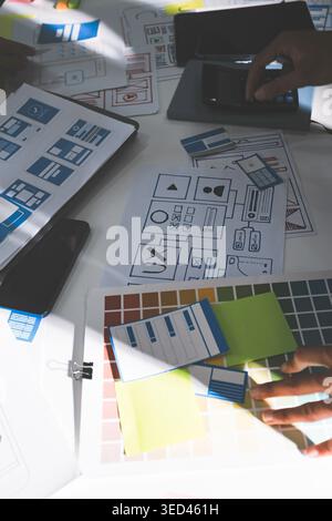 Team of Program Developer Collaborating on UXUI Design Planning in a Modern Office Environment Stock Photo