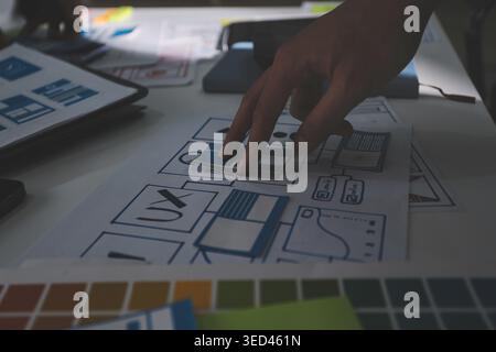 Team of Program Developer Collaborating on UXUI Design Planning in a Modern Office Environment Stock Photo