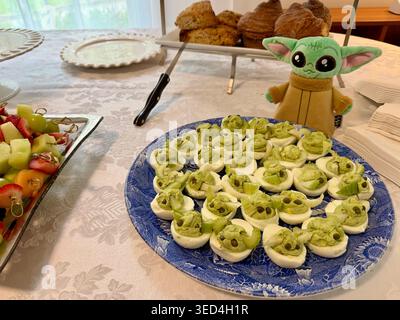 Deviled eggs and other foods set out during a baby shower celebration in Pittsburgh, Pennsylvania Stock Photo