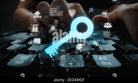 Digital Security Concept with Hands Typing on Keyboard and Large Key Symbol Overlaid Representing Cyber Protection and Access Control Sigmoid Stock Photo