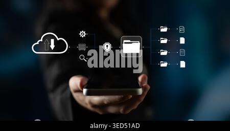 Hand Holding Smartphone with Cloud Computing Iconography, Data Security, File Management, and Technology Concept in Background Quark. Stock Photo