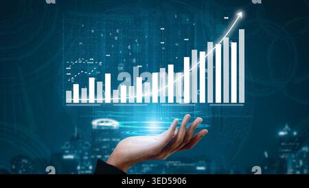 A futuristic hand presents a digital graph with rising bars against a cityscape, illustrating the concept of business growth and technological Stock Photo