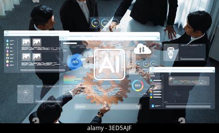 A professional team demonstrating collaboration and innovation in a modern workspace, utilizing AI technology and digital interfaces for strategic Stock Photo