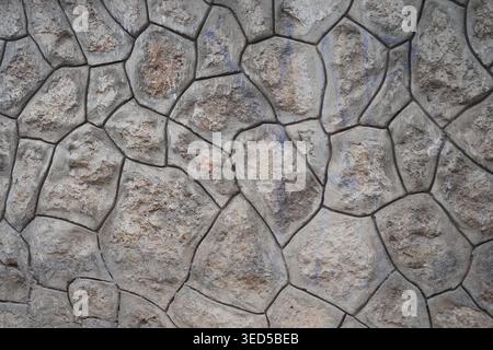 Stone wall with unique patterns and textures Stock Photo